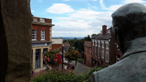 a statue edward elgar stands on Belle vue terrace, blue bird tearoom great malvern
